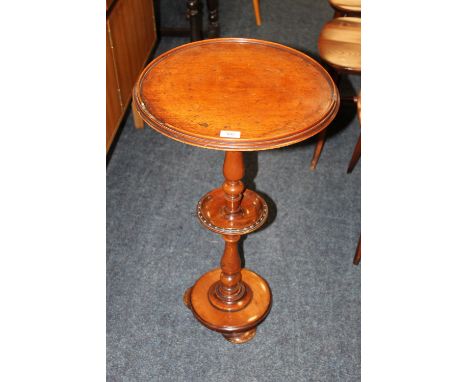 A 19TH CENTURY MAHOGANY PEDESTAL OCCASIONAL TABLE, the circular tray type top raised on a slender turned column, with small m