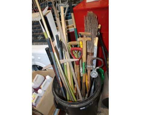 A BIN OF TOOLS TO INCLUDE RAKES, A PICK AXE, SPADES ETC, TOGETHER WITH A BOX OF HAND TOOLS AND A PUSH LAWN MOWER