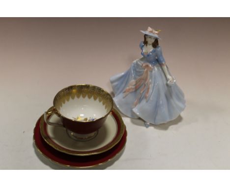 A ROYAL WORCESTER FIGURE 'FIONA; TOGETHER WITH AN AYNSLEY CUP & SAUCER SET