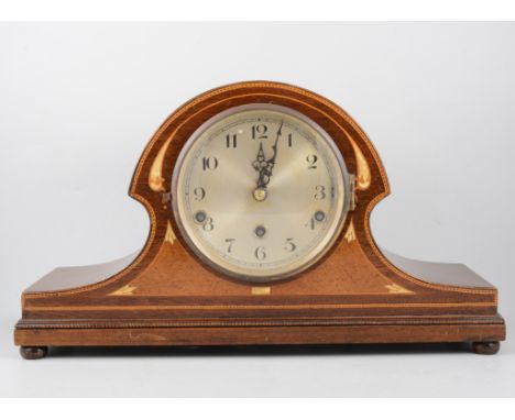 Mahogany tea caddy, in rectangular form, 20.5cm; and an inlaid mahogany hat-shape mantel clock, silvered dial, 26cm. (2)