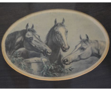 Set of four oval coloured prints, depicting three horses at a feeding trough, oak frames.