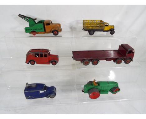 Dinky - six early diecast models comprising Aveling-Barford road roller, loudspeaker van, Fire tender, Commer tow truck, open