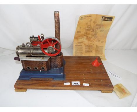 A Wilesco steam engine with related ephemera