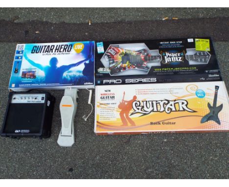 Three electronic guitars with amplifier, items in excellent condition (5)