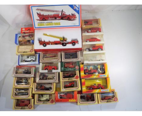 Corgi, Solido and Lledo - In excess of thirty diecast vehicles in original boxes, includes a rare Husky # 36 Fire Engine in o