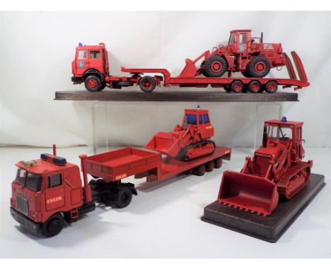 Oldcars (Italy) - three diecast vehicles all unboxed comprising a Mac and  Iveco tractor units with low loaders and earth mov