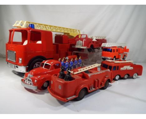 Six plastic fire engines comprising a Telsalda Airport crash tender, Mettoy battery powered engine, clockwork tender by Relia