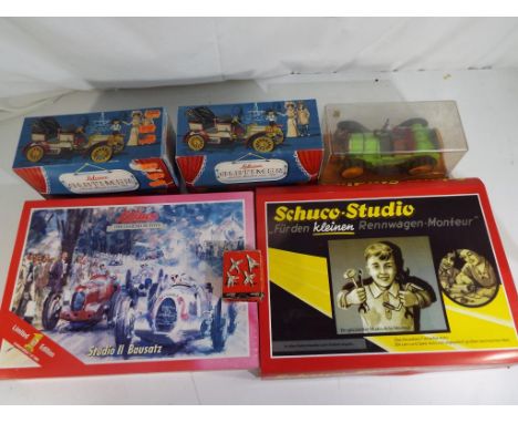 Schuco -six boxed vehicles, includes two Schuco Studio metal racing car kits, three Old Timer cars and a Thunder Jet plane, b
