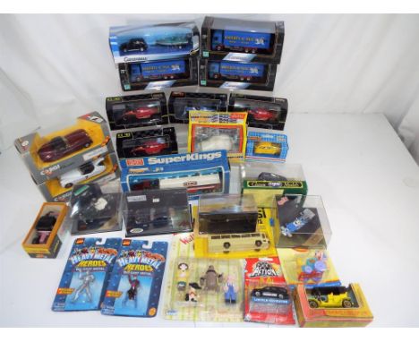 Corgi, Onyx, Cararama and others - in excess of twenty diecast vehicles in original boxes, along with some Marvel Comics pose
