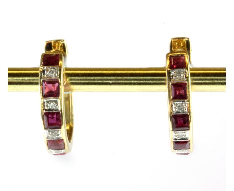 A pair of 18ct yellow gold (stamped 750) ruby and diamond set hoop earrings, Dia. 1.5cm.