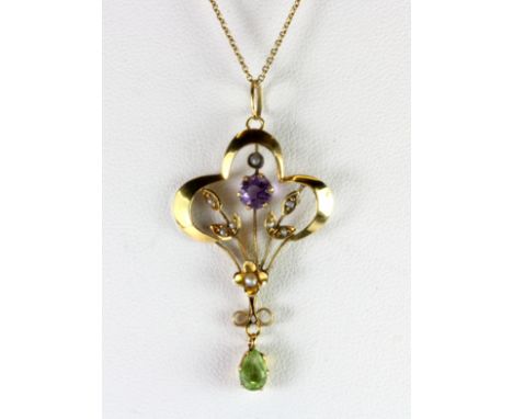 Suffragette interest. An Edwardian 9ct yellow gold pendant and chain set with amethyst, peridot and seed pearls.