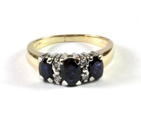 A 9ct yellow gold sapphire and diamond set ring, (K).