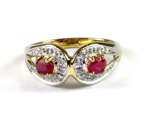 A 9ct yellow gold ruby and diamond set ring, (L.5).