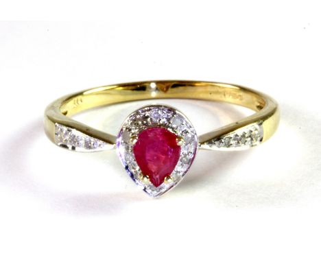 A 9ct yellow gold pear cut ruby and diamond set cluster ring, (P.5).