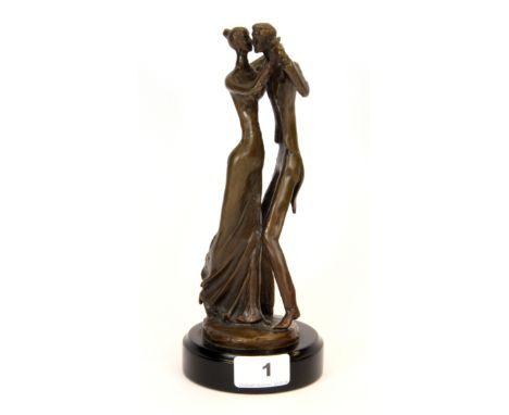 A bronze figure of a couple dancing, H. 24cm.