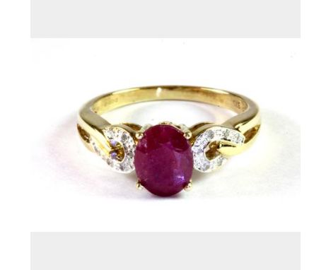 A 9ct yellow gold ruby set ring with diamond set shoulders, (M.5).