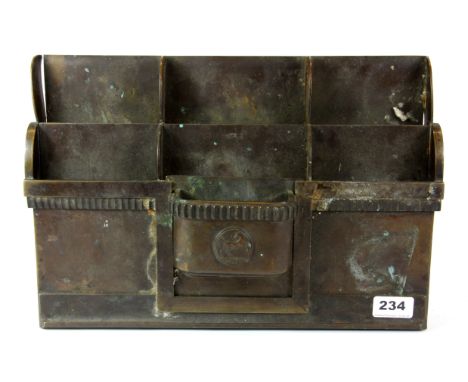 An early 20th century bronze leaflet holder for Lloyds bank with detachable ash tray, W. 38cm, H. 26cm.