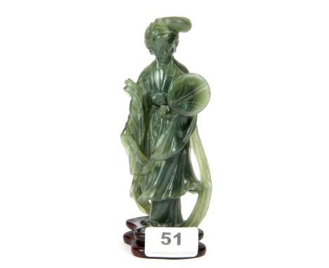 A Chinese carved jade/ hardstone figure of a Tang lady holding a fan, H. 17cm.
