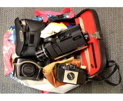 A quantity of vintage cameras.