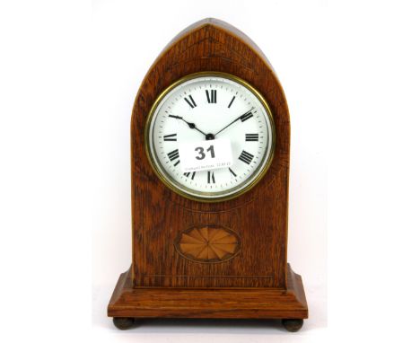 An Edwardian inlaid oak mantle clock, H. 23cm.