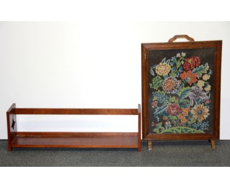 A mahogany book rack together with an oak and tapestry fire screen.