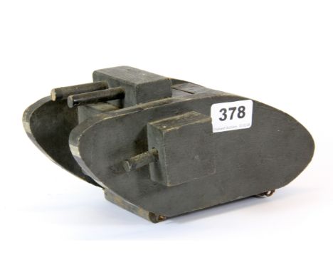 A First World War wooden tank collection box with label reading 'The Tank Bank', L. 21cm, H. 11cm.