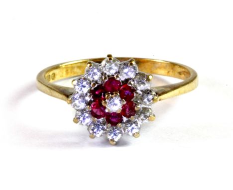 A 9ct yellow gold ruby and diamond set cluster ring, (P).