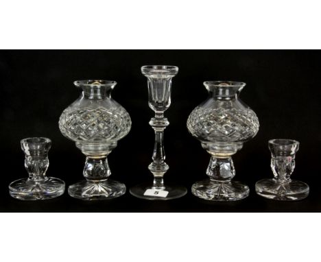 A pair of Waterford crystal candle lanterns, a pair of candlesticks together with a single candle stick, H. 21cm.