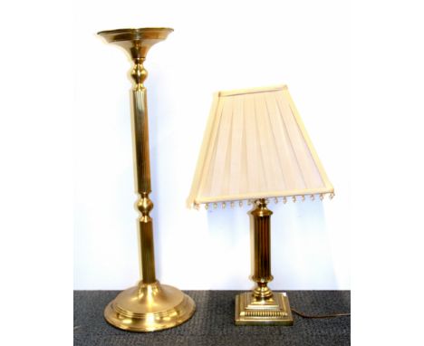 A brass table lamp with shade, H. 70cm, together with a brass column plant stand, H. 84cm.
