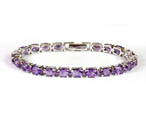 A 925 silver amethyst and white stone set bracelet