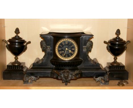 A superb 19th century French slate and bronze clock set by Japy Freres c. 1848, H. 29cm.