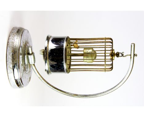 A 1930's chrome bird cage clock.