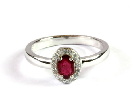 A 925 silver ruby and  white stone set cluster ring, (N.5).