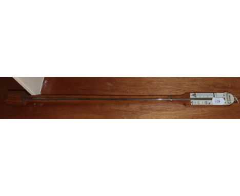 A late 19th century oak stick barometer, single vernier dial, signed on a arched ivory plaque Langford, Bristol 