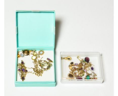 A 9 carat gold amethyst pendant on a 9 carat gold chain, pendant length 4.0cm, chain length 46cm; an amethyst and split pearl