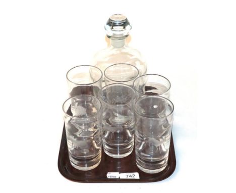 A set of six Scandinavian etched glass tumblers, decorated with various animals and a matching decanter 