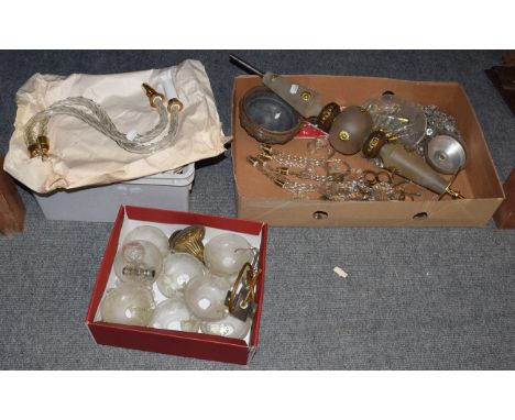 A gilt metal and glass ten-light chandelier with scroll arms