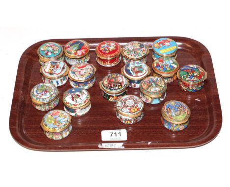 A collection of seventeen Halcyon Days enamel Christmas trinket boxes, from 1990 to 2006 (no boxes)