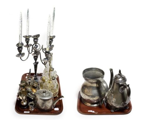A collection of silver plate and EPNS including five-light candelabra, egg cruet, bottle cruet etc (on two trays)