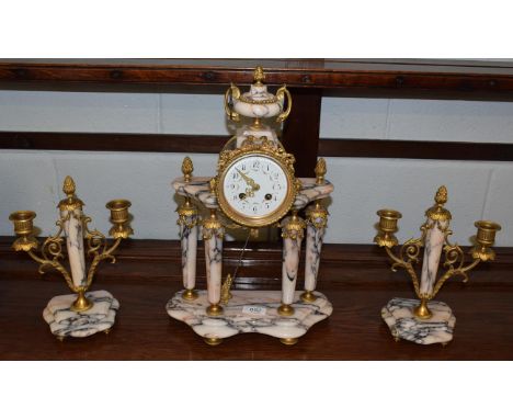 A French marble striking portico mantel clock with garniture 