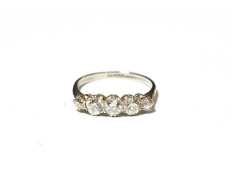 A diamond five stone ring, stamped 'PLAT', finger size N.  Gross weight 3.0 grams. 