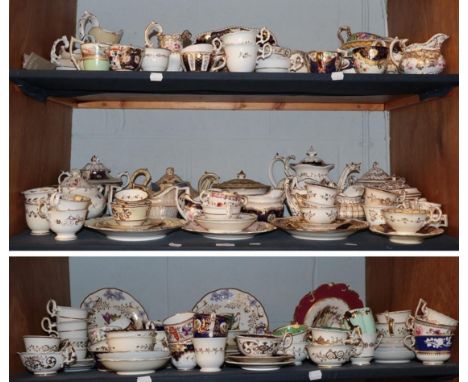 A large quantity of 19th century tea wares including Coalport, Derby, Spode, Ridgeway and others (on three shelves)