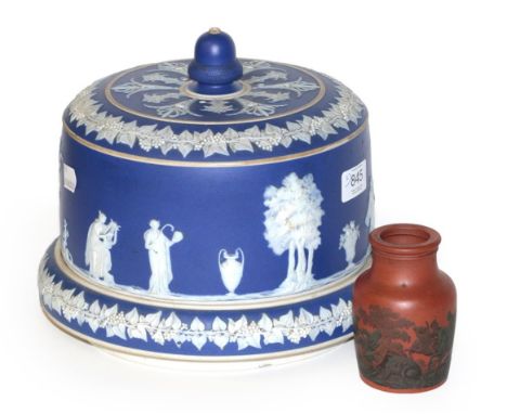 An early 19th century black transfer printed red stone ware jar, decorated with a boar hunting scene; together with a later W