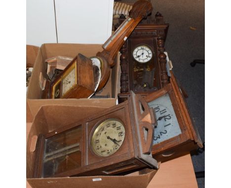 A Vienna type striking wall clock, two Art Deco striking wall clocks, an oak cased aneroid barometer, two mantel clocks and a