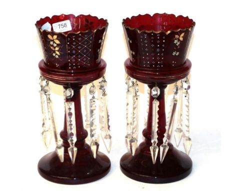 A pair of ruby glass table lustres, circa 1890, with painted foliate panels and prismatic drops, 31.5cm 