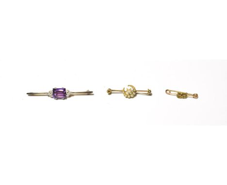 An amethyst and diamond bar brooch, stamped '18CT &amp; 15CT', length 6.1cm; together with two Edwardian seed pearl bar brooc