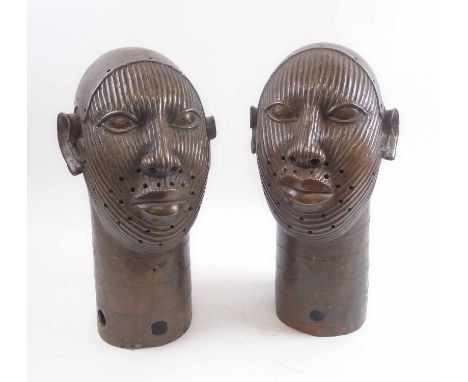 PAIR OF BRONZE IFE HEAD SCULPTURES, each 41cm H. (2)