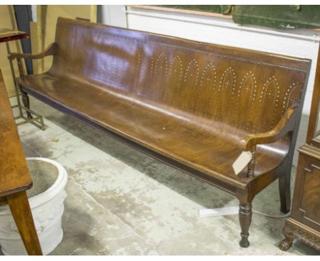 RAILWAY WAITING ROOM BENCH, English, late 19th century oak framed, Gothic pierced bentwood with handles and turned supports, 