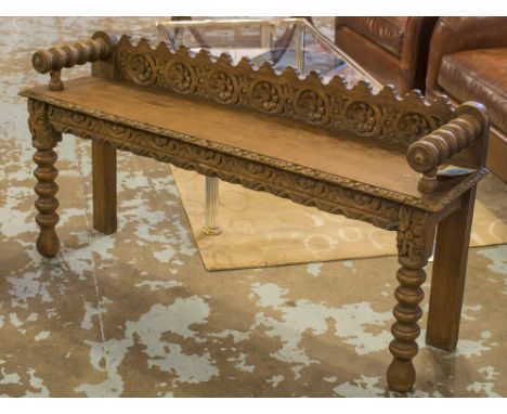 HALL BENCH, Victorian Gothic oak carved with a rosette decorated back and a rectangular seat, 121cm W x 61cm H x 29cm D. (wit