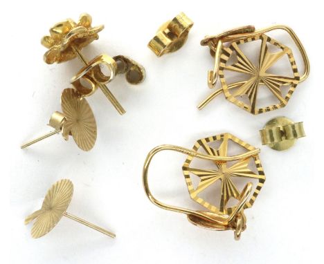 Two pairs of 9ct gold earrings, with additional backs and a single stud, combined 2.2g. P&amp;P Group 1 (£14+VAT for the firs